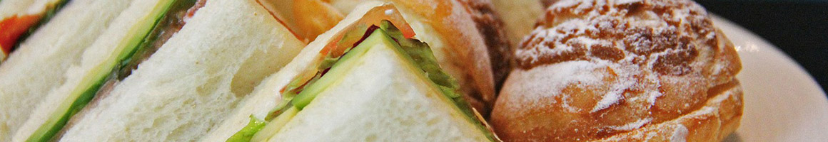 Eating Sandwich Vegan at The Pureganic Cafe restaurant in Rye, NY.